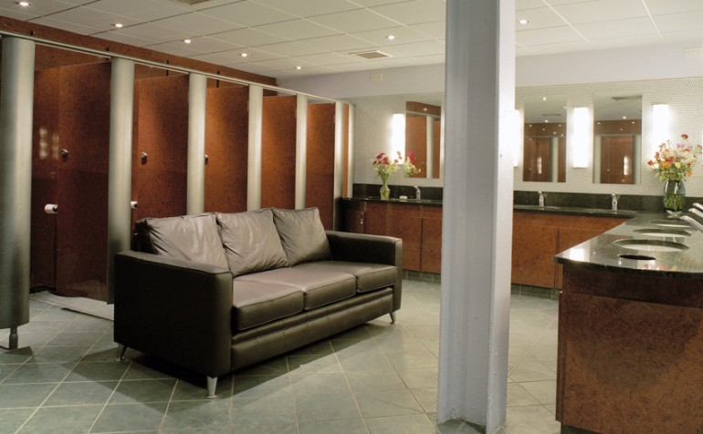 Ladies toilets with sofa, mirrors and granite work-top