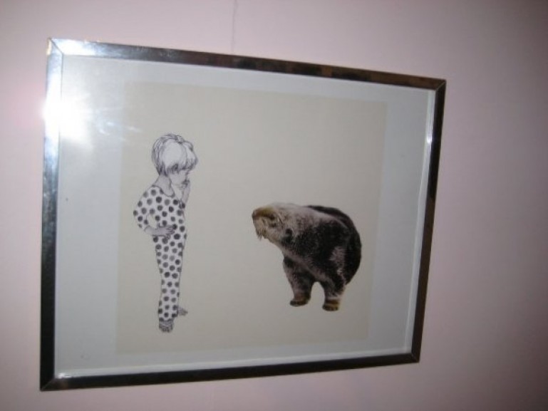 Illustration of a small child pondering next to an otter