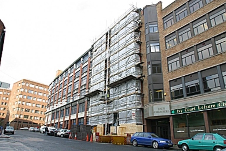 Exterior of the WHQ building in scaffolding